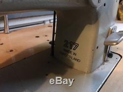 Bernina 217 high-speed industrial sewing machine with table See All Pictures
