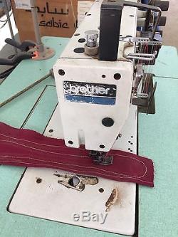 Brother industrial sewing machine 5 threads. Model# FD4-B272
