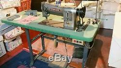 Consew Model 206RB-1 industrial sewing machine with table