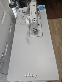 Juki DDL-8700H Industrial Sewing Machine with Table & Servo Motor. Open to offers