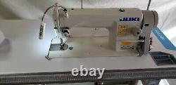 Juki DDL-8700 SEWING MACHINE WITH T-LEGS STAND, CASTERS, SERVO MOTOR LED LAMP