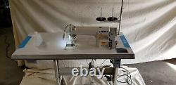 Juki DDL-8700 SEWING MACHINE WITH T-LEGS STAND, CASTERS, SERVO MOTOR LED LAMP