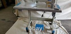 Juki DDL-8700 SEWING MACHINE WITH T-LEGS STAND, CASTERS, SERVO MOTOR LED LAMP