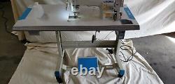 Juki DDL-8700 SEWING MACHINE WITH T-LEGS STAND, CASTERS, SERVO MOTOR LED LAMP