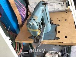 SINGER 269x1292 INDUSTRIAL SEWING MACHINE complete with table and pedals