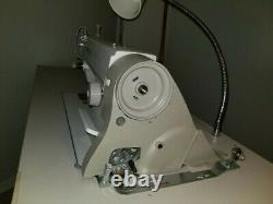 Singer Sewing Machine Model 2491 pre-owned with Table and Servo Motor Commercial