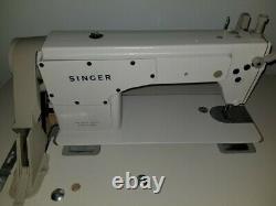 Singer Sewing Machine Model 2491 pre-owned with Table and Servo Motor Commercial