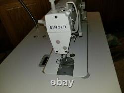 Singer Sewing Machine Model 2491 pre-owned with Table and Servo Motor Commercial