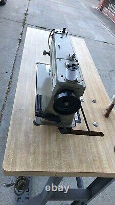 Singer industrial sewing machine used model# 591D300AD