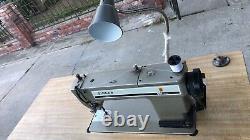 Singer industrial sewing machine used model# 591D300AD