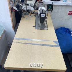 Used Juki industrial sewing machines for sale with table and lamp